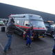 VW/GMC A-team campervan, joined by some guys in questionable A-team outfits doing a weird dance.